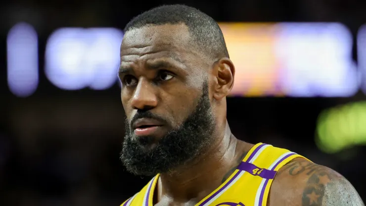 LeBron James #23 of the Los Angeles Lakers walks on the court during a break in the third quarter of a preseason game against the Golden State Warriors at T-Mobile Arena at T-Mobile Arena on October 15, 2024 in Las Vegas, Nevada. The Warriors defeated the Lakers 111-97.
