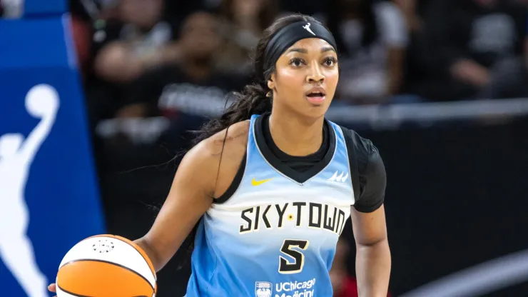 Angel Reese of the Chicago Sky looks up during a WNBA game
