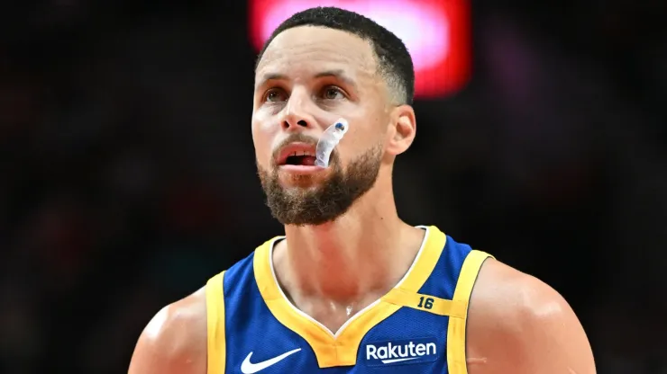 Golden State Warriors' Stephen Curry in action during the 2024-25 debut against the Portland Trail Blazers. 
