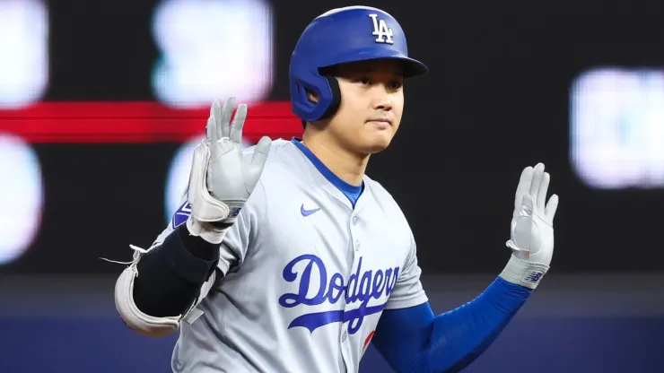 Shohei Ohtani #17 of the Los Angeles Dodgers reacts after hitting a double against the Miami Marlins during the first inning of the game at loanDepot park on September 19, 2024, in Miami, Florida.
