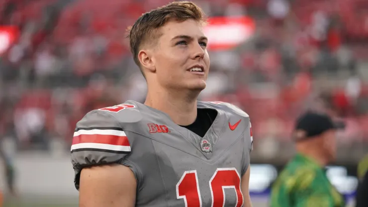 Quarterback Will Howard #18 of the Ohio State Buckeyes walks off the field after the game against the Iowa Hawkeyes at Ohio Stadium on October 05, 2024 in Columbus, Ohio.
