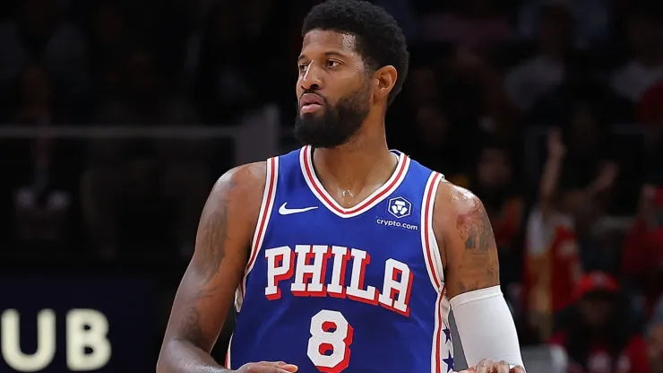 Paul George #8 of the Philadelphia 76ers brings the ball up the court against the Atlanta Hawks during the second quarter at State Farm Arena on October 14, 2024 in Atlanta, Georgia. 
