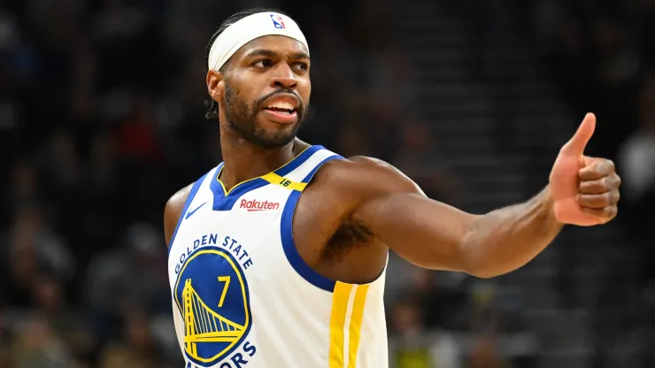 Buddy Hield #7 of the Golden State Warriors motions to a teammate during the second half of a game against the Utah Jazz at Delta Center on October 25, 2024 in Salt Lake City, Utah. 
