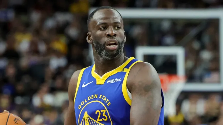 Draymond Green #23 of the Golden State Warriors brings the ball up the court against the Los Angeles Lakers in the second quarter of their preseason game at T-Mobile Arena at T-Mobile Arena on October 15, 2024 in Las Vegas, Nevada. The Warriors defeated the Lakers 111-97.
