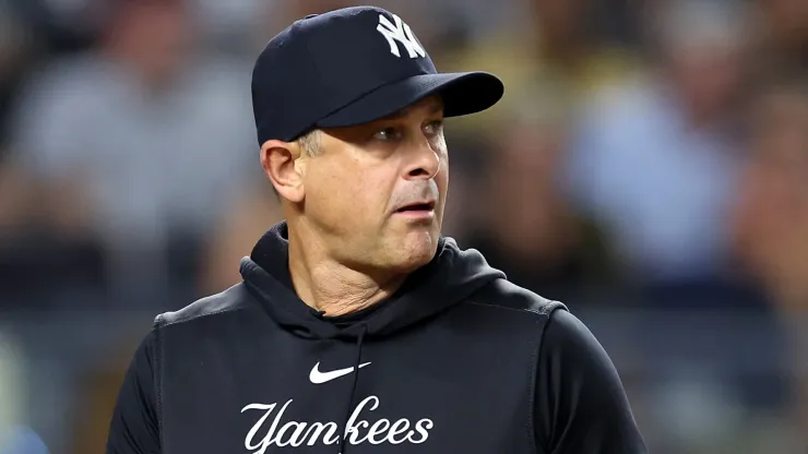 Aaron Boone #17 of the New York Yankees looks on against the Boston Red Sox at Yankee Stadium on September 13, 2024 in the Bronx borough of New York City. 
