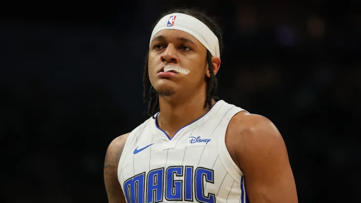 Paolo Banchero #5 of the Orlando Magic walks backcourt during a game against the Milwaukee Bucks
