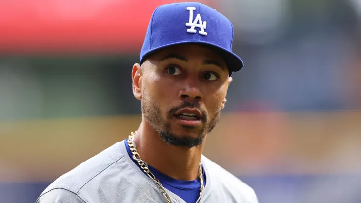 Mookie Betts #50 of the Los Angeles Dodgers participates in warmups prior to a game against the Milwaukee Brewers at American Family Field on August 14, 2024 in Milwaukee, Wisconsin.
