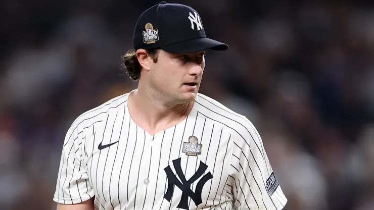 Gerrit Cole #45 of the New York Yankees reacts after Teoscar Hernández #37 of the Los Angeles Dodgers hit a two-RBI double during the fifth inning of Game Five of the 2024 World Series at Yankee Stadium on October 30, 2024 in the Bronx borough of New York City. 
