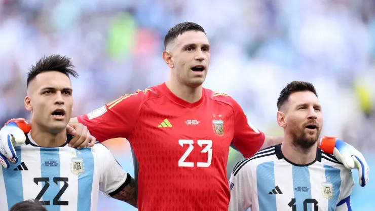 Lautaro Martinez, Emiliano Martinez and Lionel Messi of Argentina sing the national anthem prior to the FIFA World Cup Qatar 2022 Group C match between Argentina and Saudi Arabia at Lusail Stadium on November 22, 2022 in Lusail City, Qatar.
