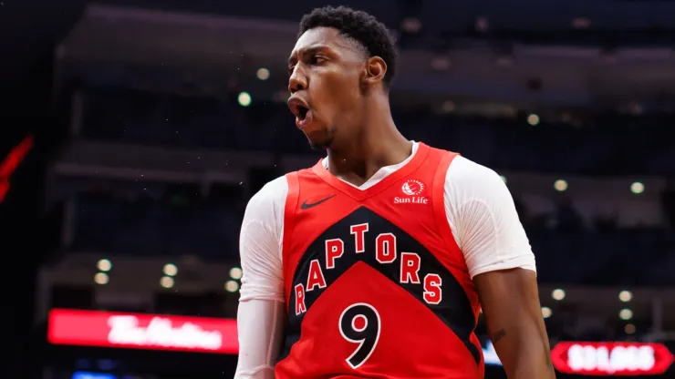 RJ Barrett #9 of the Toronto Raptors reacts after sinking a basket against Anthony Davis #3 of the Los Angeles Lakers during the second half of their NBA game at Scotiabank Arena on November 1, 2024 in Toronto, Canada. 
