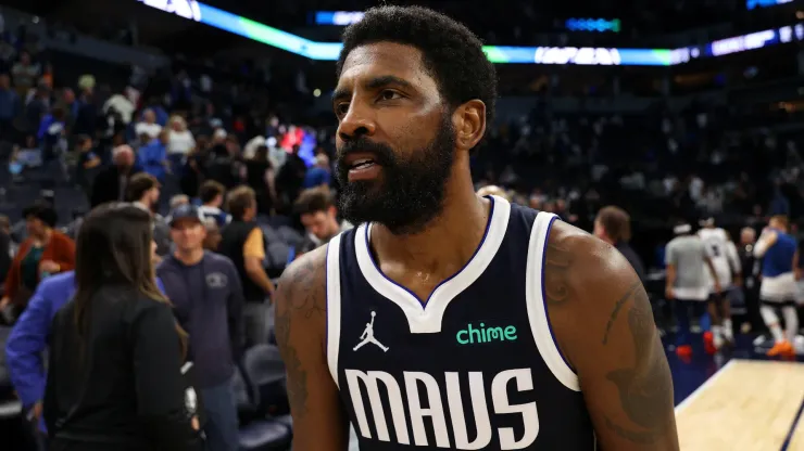 Kyrie Irving #11 of the Dallas Mavericks walks off the court after the game against the Minnesota Timberwolves at Target Center
