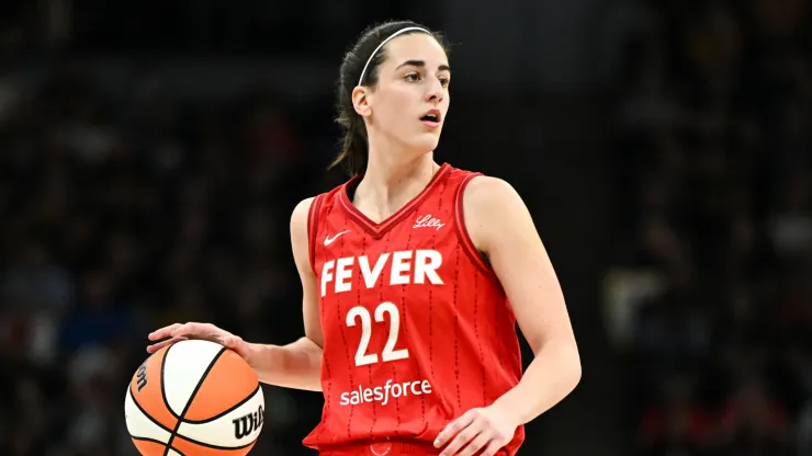 Caitlin Clark #22 of the Indiana Fever dribbles the ball in the first quarter of the game against the Minnesota Lynx
