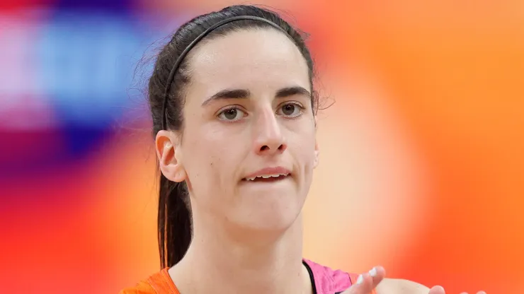 Caitlin Clark  looks on during the second half against Team USA during the 2024 WNBA All Star Game
