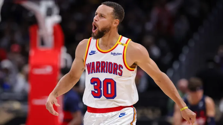 Stephen Curry #30 of the Golden State Warriors reacts after a play against the Washington Wizards during the second half at Capital One Arena
