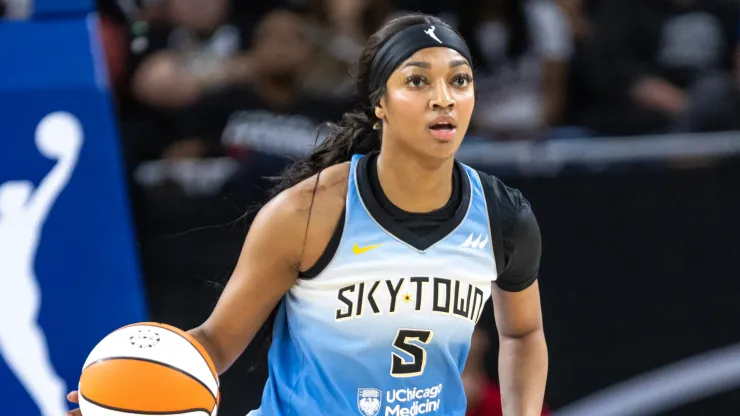  Angel Reese #5 of the Chicago Sky dribbles down the court against the Los Angeles Sparks during the first quarter at Wintrust Arena 
