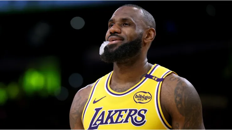  LeBron James #23 of the Los Angeles Lakers smiles as he enters the game against the Memphis Grizzlies during a 128-123 Lakers win at Crypto.com Arena on November 13, 2024 in Los Angeles, California. 
