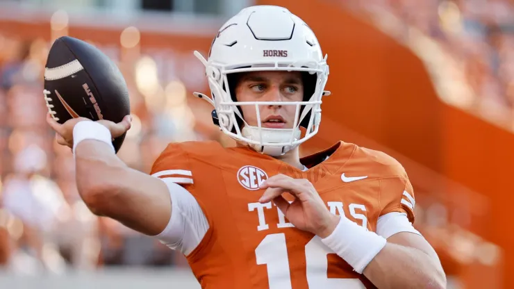 Arch Manning #16 of the Texas Longhorns warms up before the game against the Louisiana Monroe Warhawks at Darrell K Royal-Texas Memorial Stadium on September 21, 2024.
