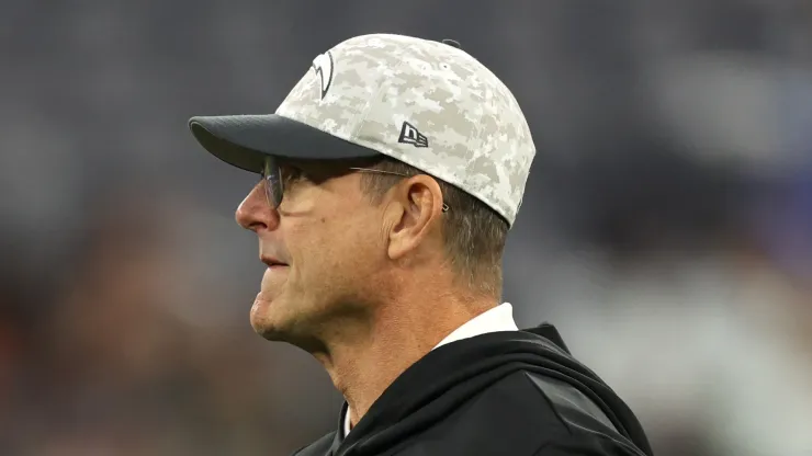 Head coach Jim Harbaugh of the Los Angeles Chargers catches a ball before the game against the Cincinnati Bengals at SoFi Stadium on November 17, 2024 in Inglewood, California.
