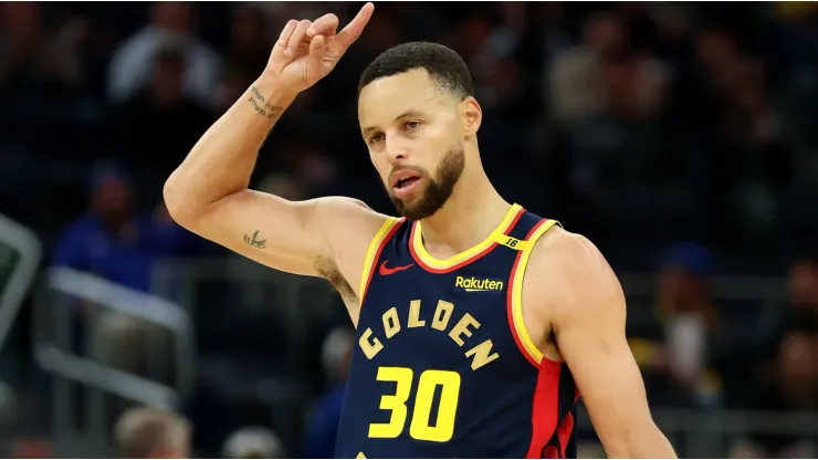 Stephen Curry #30 of the Golden State Warriors reacts after the Warriors scored a basket against the Atlanta Hawks in the second half at Chase Center on November 20, 2024 in San Francisco, California. 
