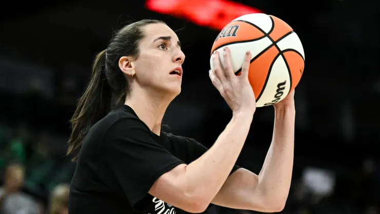 Caitlin Clark #22 of the Indiana Fever warms up before the game against the Minnesota Lynx
