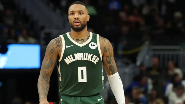 Damian Lillard #0 of the Milwaukee Bucks walks backcourt during a game against the Chicago Bulls at Fiserv Forum
