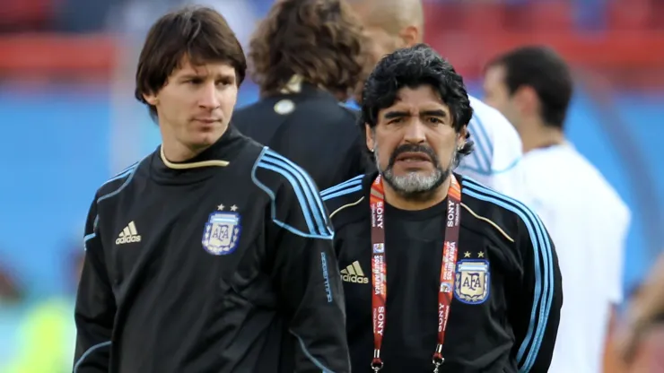 Diego Maradona head coach of Argentina conducts warm up exercises with forward Lionel Messi of Argentina ahead of the 2010 FIFA World Cup South Africa Group B match between Argentina and Nigeria
