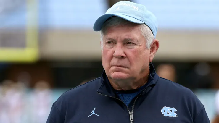 Head coach Mack Brown of the North Carolina Tar Heels watches his team warm up before their game against the Florida State Seminoles at Kenan Memorial Stadium on October 09, 2021 in Chapel Hill, North Carolina.
