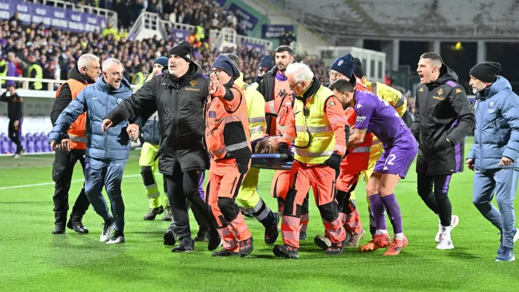 Fiorentina's midfielder Edoardo Bove is attended on the pitch 
