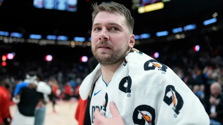 Luka Doncic #77 of the Dallas Mavericks walks off the court after the game against the Portland Trail Blazers at Moda Center
