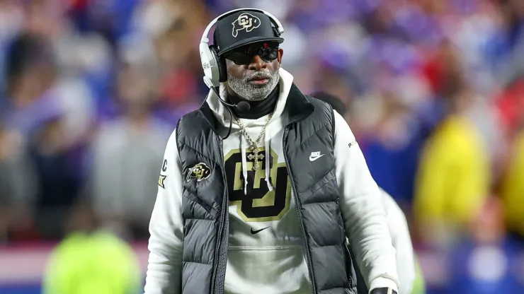 Colorado Buffaloes head coach Deion Sanders walks the field during the two minute warning time out against the Kansas Jayhawks in 2024.
