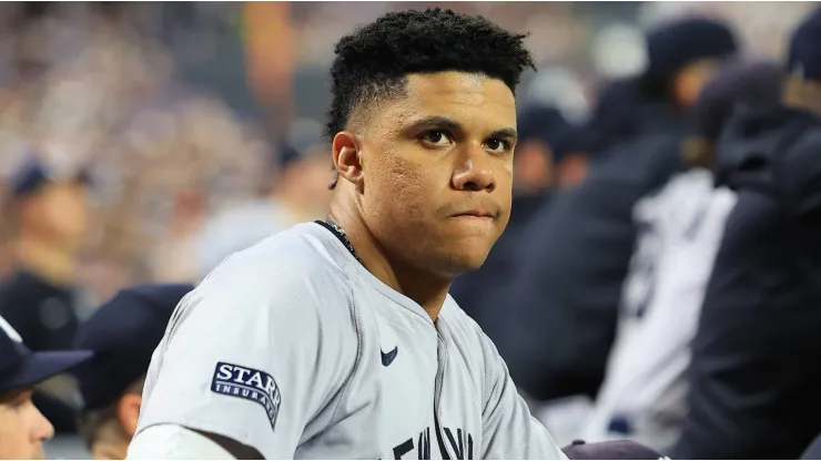 Juan Soto 22 of the New York Yankees is watching the action from the dugout during the sixth inning of the baseball game against the New York Mets.
