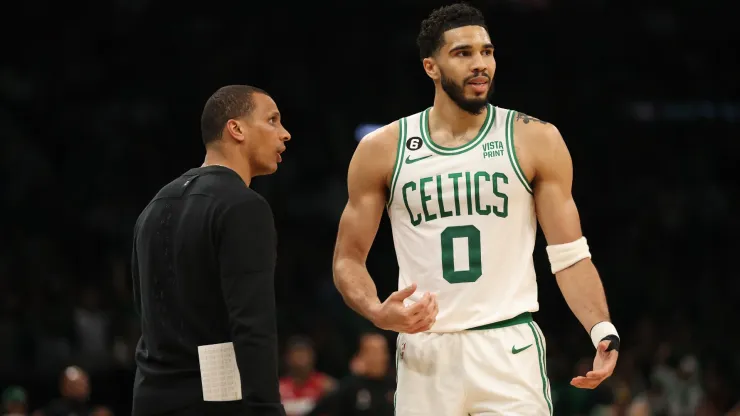 Jayson Tatum #0 of the Boston Celtics speaks with head coach Joe Mazzulla during game one of the Eastern Conference Finals against the Miami Heat at TD Garden on May 17, 2023 in Boston, Massachusetts. 
