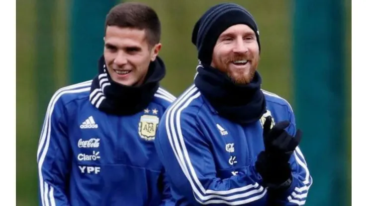 Bustos junto a Messi en la Selección Argentina.
