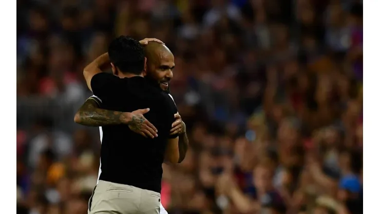 FC Barcelona, Barca v Pumas UNAM - Joan Gamper Trophy Dani Alves of Pumas and Xavi Hernandez head coach of Barcelona gr
