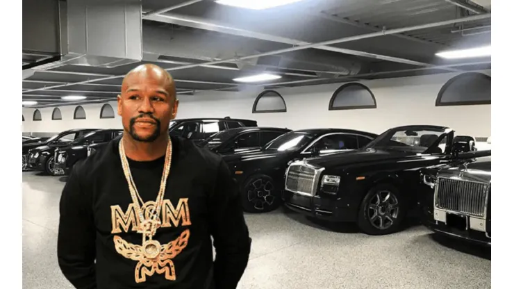 Floyd Mayweather y su Rolls Royce.
