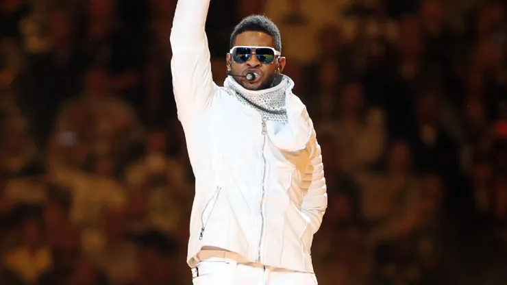 Usher performs during the Bridgestone Super Bowl XLV Halftime Show at Dallas Cowboys Stadium.
