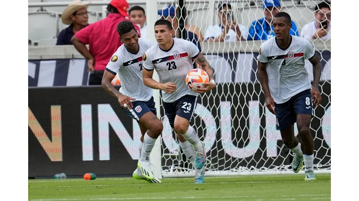 Cuba's Luis Paradela (23) carries the ball after scoring on a penalty kick against Canada during the first half of a CONCACAF Gold Cup soccer match Tuesday, July 4, 2023, in Houston. (AP Photo/David J. Phillip)
