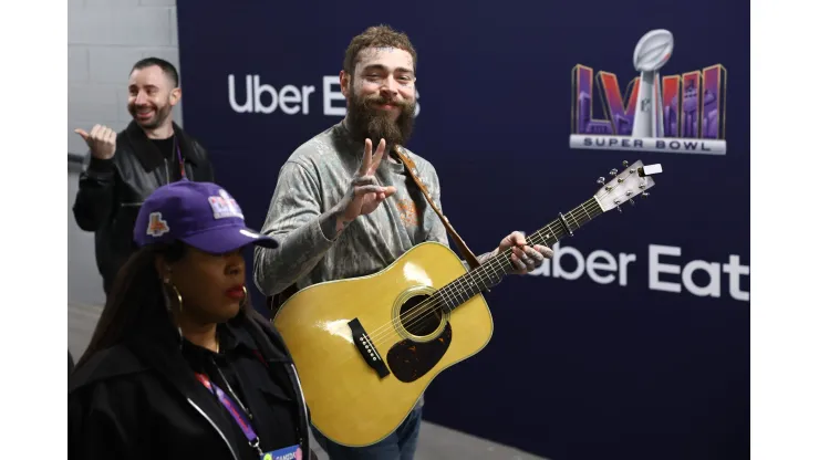 LAS VEGAS, NEVADA - FEBRUARY 11: American rapper and singer Post Malone reacts before Super Bowl LVIII at Allegiant Stadium on February 11, 2024 in Las Vegas, Nevada. (Photo by Tim Nwachukwu/Getty Images)