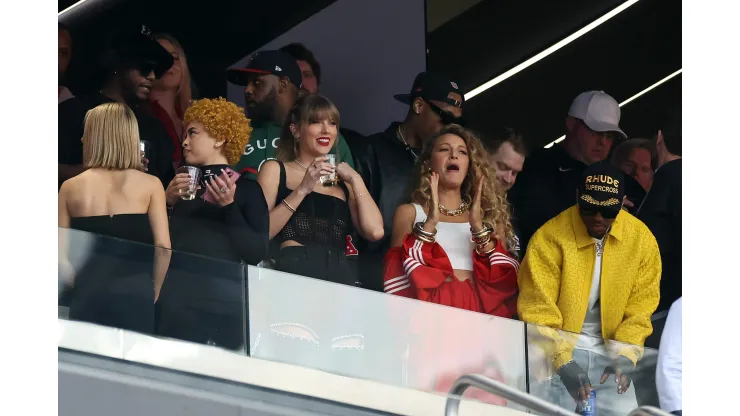 LAS VEGAS, NEVADA - FEBRUARY 11: Singer Taylor Swift and Actress Blake Lively react before Super Bowl LVIII between the San Francisco 49ers and Kansas City Chiefs at Allegiant Stadium on February 11, 2024 in Las Vegas, Nevada. (Photo by Ezra Shaw/Getty Images)