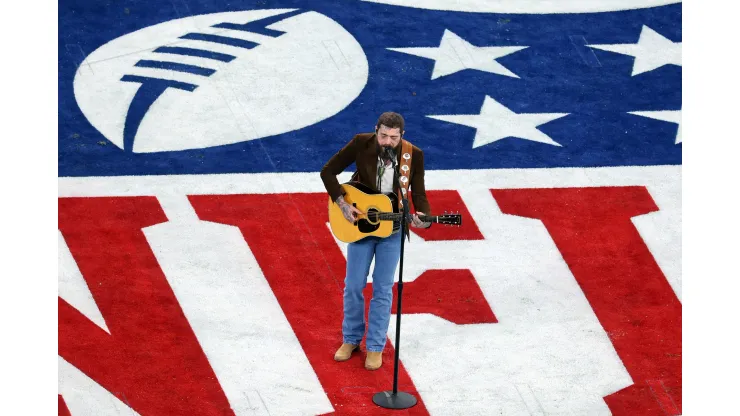 LAS VEGAS, NEVADA - FEBRUARY 11: American rapper and singer Post Malone performs prior to Super Bowl LVIII between the San Francisco 49ers and Kansas City Chiefs at Allegiant Stadium on February 11, 2024 in Las Vegas, Nevada. (Photo by Michael Reaves/Getty Images)