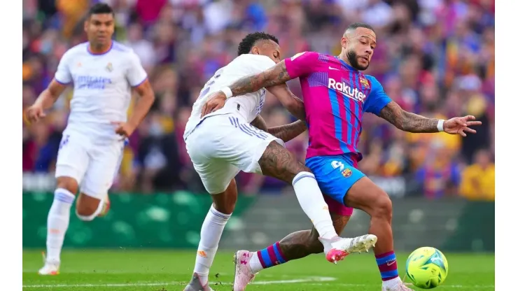 Militão e Depay disputam a bola dentro de campo (Foto: Getty Images)
