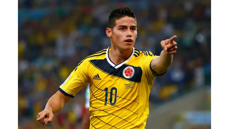 RIO DE JANEIRO, BRAZIL - JUNE 28:  James Rodriguez of Colombia celebrates scoring his team's second goal and his second of the game during the 2014 FIFA World Cup Brazil round of 16 match between Colombia and Uruguay at Maracana on June 28, 2014 in Rio de Janeiro, Brazil.  (Photo by Clive Rose/Getty Images)
