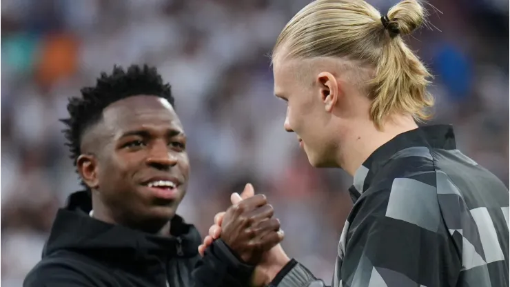  Erling Haaland of Manchester City embraces Vinicius Junior of Real Madrid . (Photo by Angel Martinez/Getty Images)
