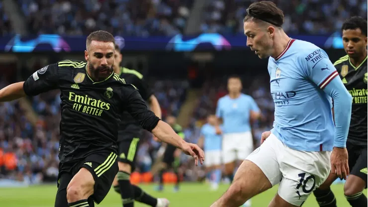 Jack Grealish of Manchester City from Dani Carvajal of Real Madrid . (Photo by Clive Brunskill/Getty Images)
