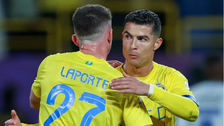 Cristiano Ronaldo e Laporte são companheiros no Al Nassr.
