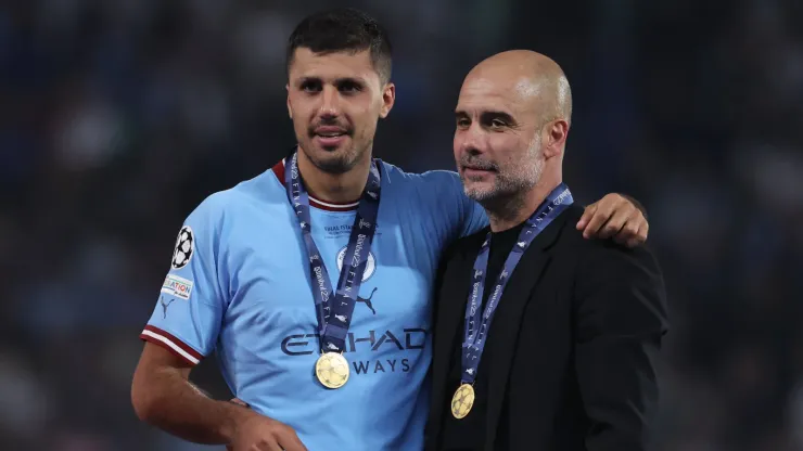 Guardiola e Rodri lado a lado
