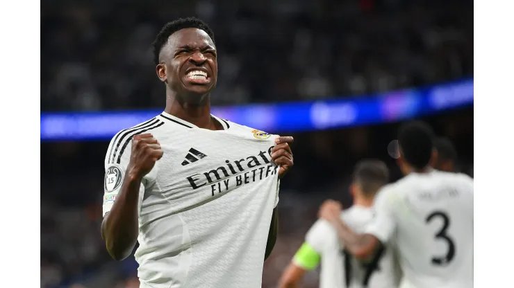 MADRID, SPAIN - OCTOBER 22: Vinicius Junior of Real Madrid celebrates scoring his team's fifth goal during the UEFA Champions League 2024/25 League Phase MD3 match between Real Madrid C.F. and Borussia Dortmund at Estadio Santiago Bernabeu on October 22, 2024 in Madrid, Spain. (Photo by Denis Doyle/Getty Images)
