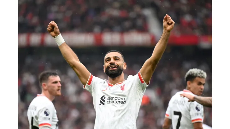 MANCHESTER, ENGLAND - SEPTEMBER 01: Mohamed Salah of Liverpool celebrates scoring his team's third goal during the Premier League match between Manchester United FC and Liverpool FC at Old Trafford on September 01, 2024 in Manchester, England. (Photo by Michael Regan/Getty Images)
