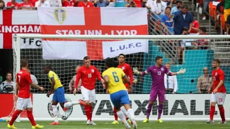 MIAMI GARDENS, FL – JUNE 04: Enner Valencia of Ecuador turns to celebrate after scoring the first goal as Ben Foster of England reacts during the International friendly match between England and Ecuador at Sun Life Stadium on June 4, 2014 in Miami Gardens, Florida. (Photo by Richard Heathcote/Getty Images)
