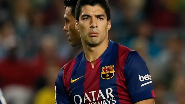 Barcelona's Luis Suarez (R) and Lionel Messi are pictured during their Spanish first division soccer match against Celta Vigo at Camp Nou stadium in Barcelona November 1, 2014. REUTERS/Albert Gea (SPAIN – Tags: SPORT SOCCER)